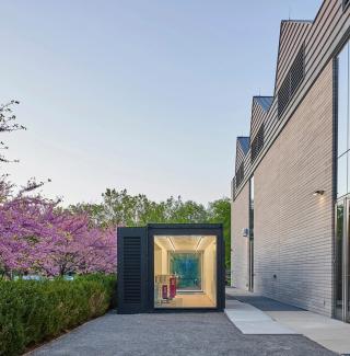 Color photograph of the KilnHouse next to the Logan Center