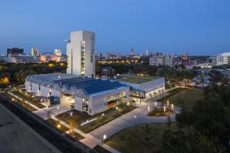 View of the Logan Center for the Arts building during dusk.